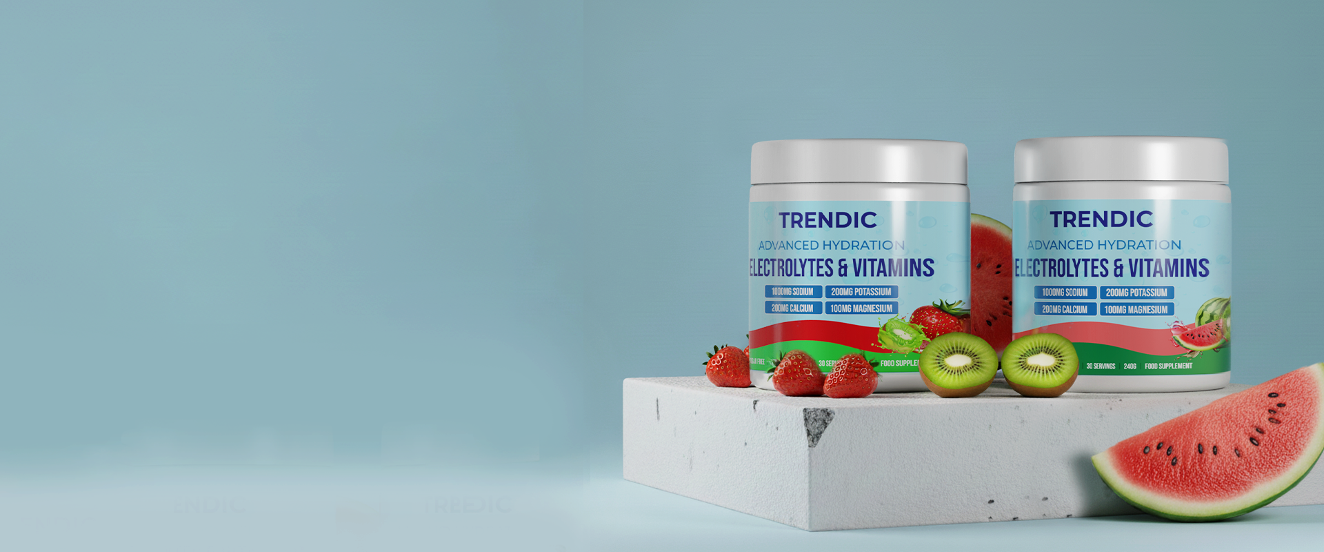 Two containers of Trendic Electrolytes & Vitamins with fruits on a light blue background